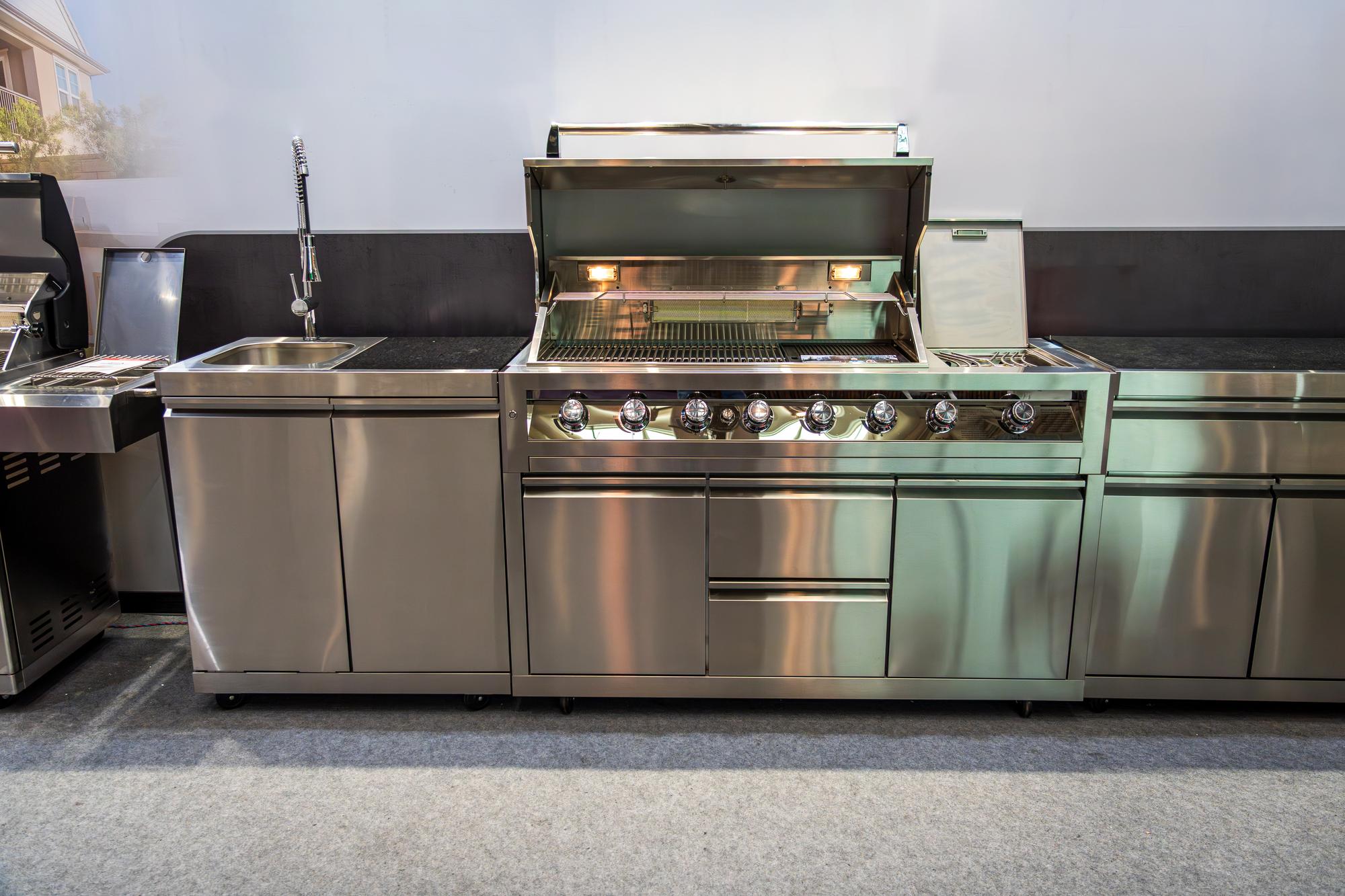 small commercial kitchen with stainless surfaces